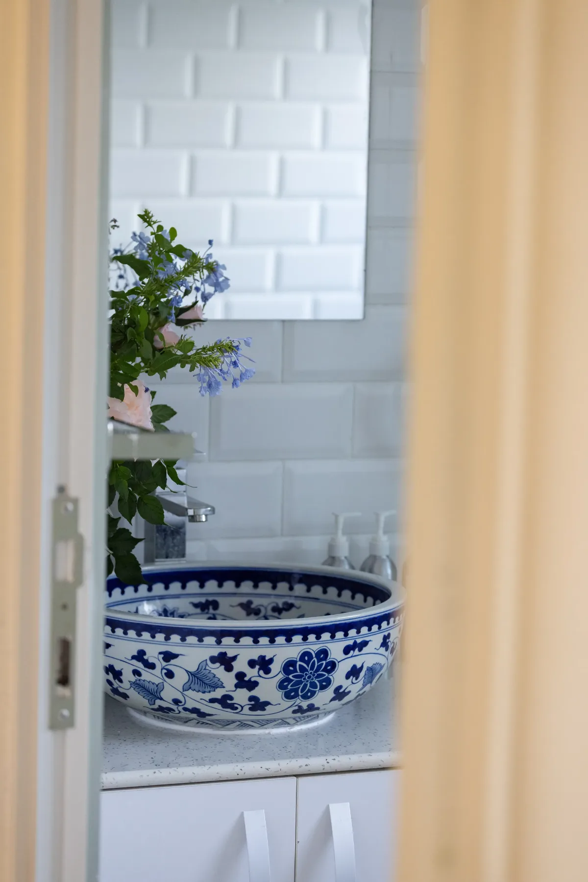The blue and white porcelain basin in the bathroom